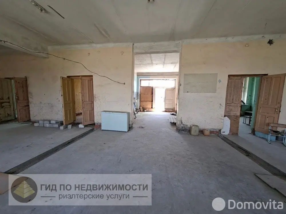 Купить помещение под сферу услуг в Рогах, ул. Школьная, д. 1 - фото 15