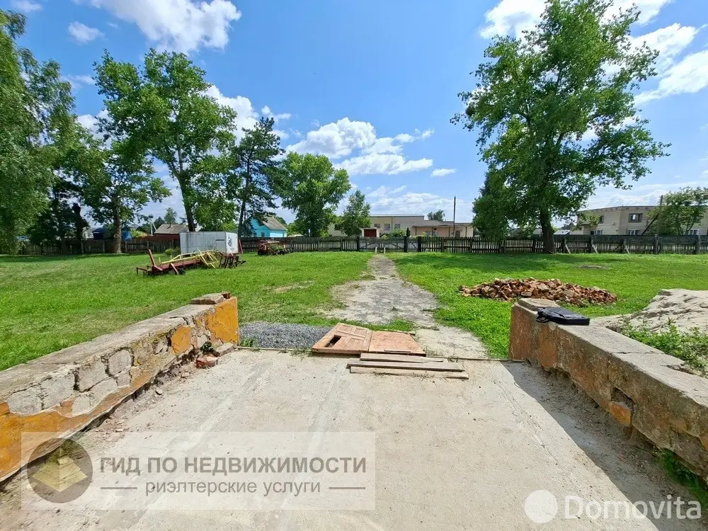 Купить помещение под сферу услуг в Рогах, ул. Школьная, д. 1 - фото 16