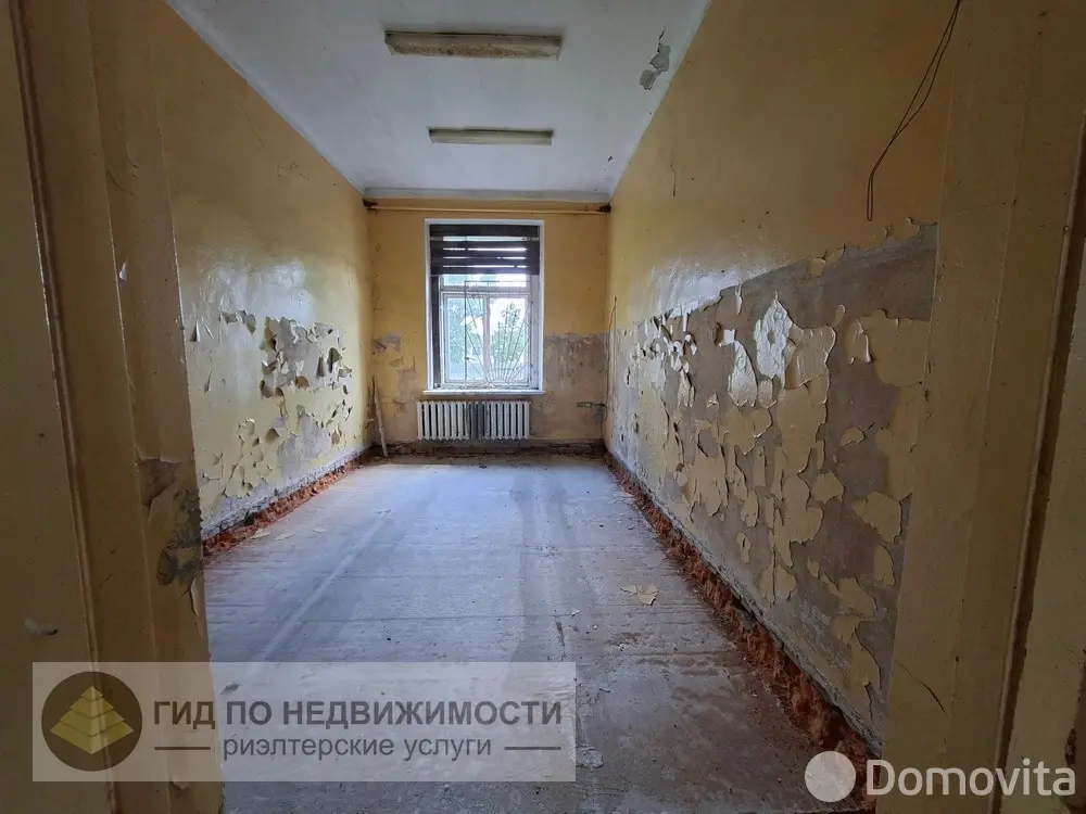 Купить помещение под сферу услуг в Рогах, ул. Школьная, д. 1 - фото 11