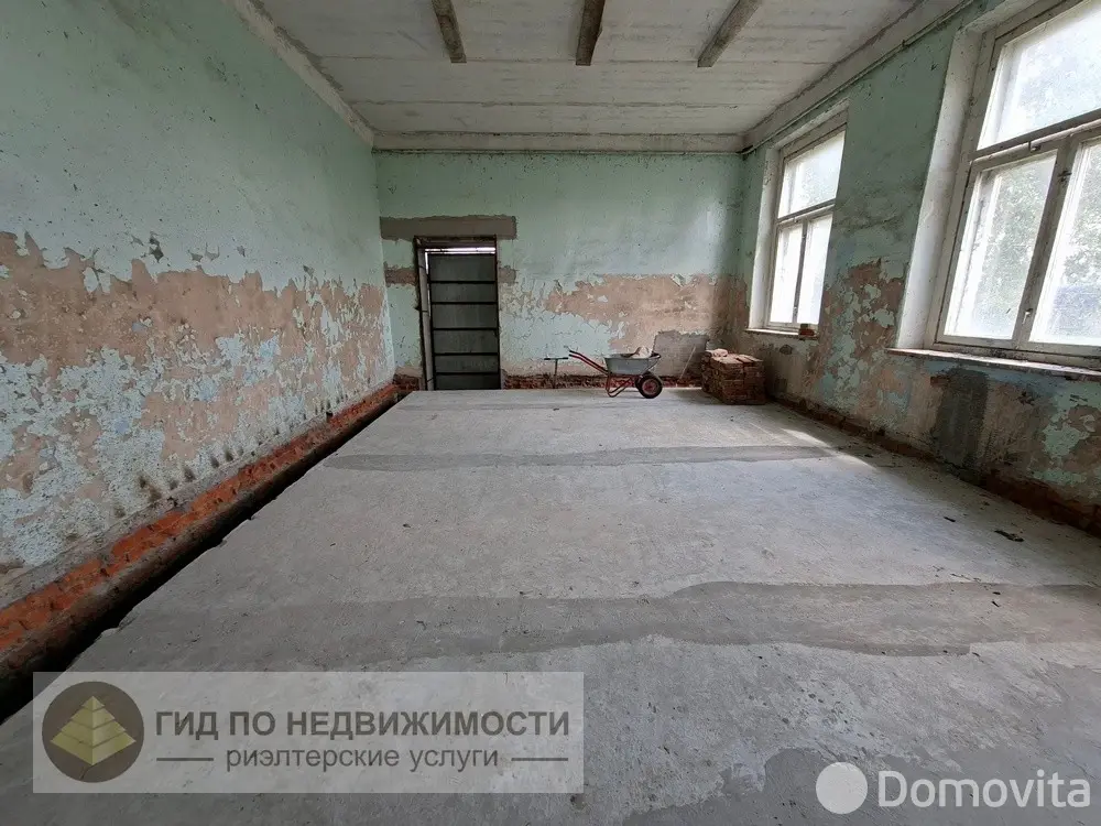 Купить помещение под сферу услуг в Рогах, ул. Школьная, д. 1 - фото 12